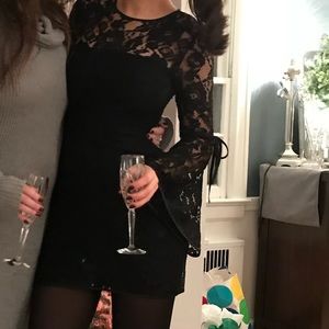 Black lace mini dress with bell bottom sleeves